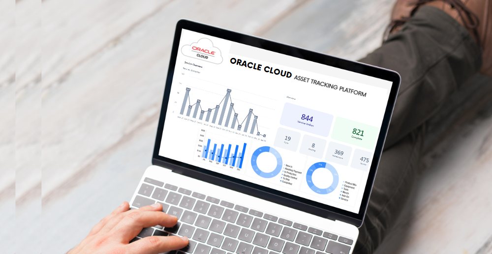 Laptop displaying an Oracle Cloud asset tracking dashboard